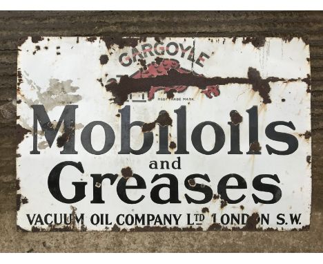 A Mobiloils and Greases rectangular enamel sign by the Falkirk Iron Company, 45 x 30". 