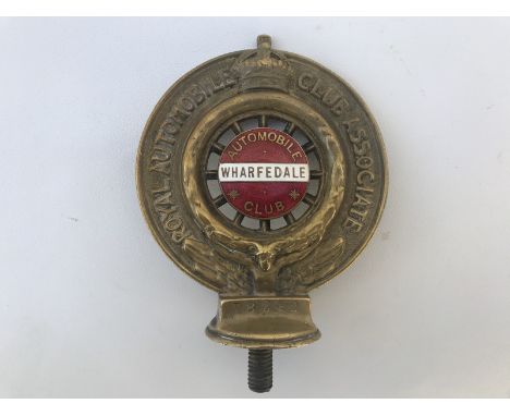 A Royal Automobile Club Associate car badge with Wharfedale Automobile Club enamel centre, by Elkington, stamped B8242.