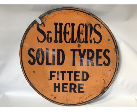 A rare St. Helen's Solid Tyres Fitted Here circular enamel sign, 36" diameter.