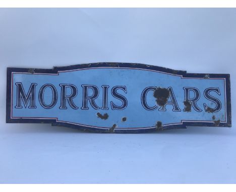 An early Morris escutcheon shaped double sided enamel sign in two-tone blue, 36 3/4 x 12".