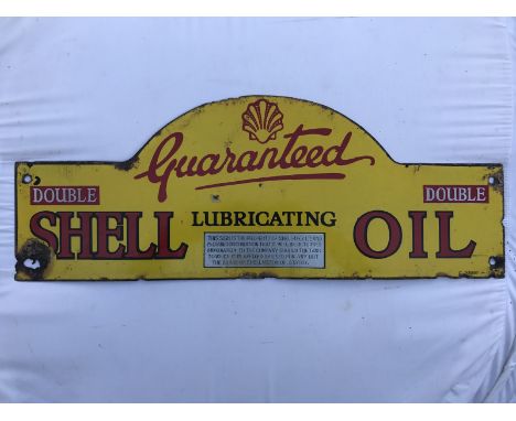 A Double Shell Lubricating Oil enamel oil cabinet pediment sign, 25 x 9 1/2".