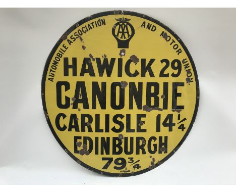 An AA and Motor Union circular yellow and black enamel village/town sign for Canonbie, Edinburgh 79 3/4 miles, the sign by Jo