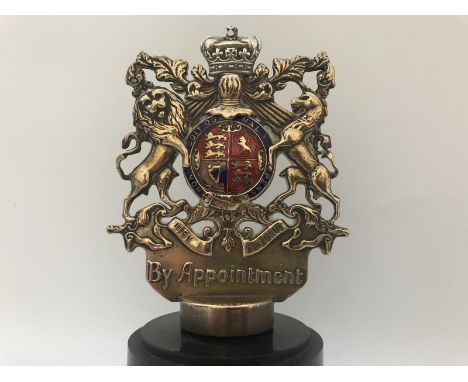 A Leyland Lorries 'By Appointment' mascot, polished brass and enamel, display base mounted.