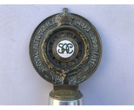 A Royal Automobile Club Associate badge with Somerset Automobile Club part enamel centre and celluloid backing, dated 1915, s