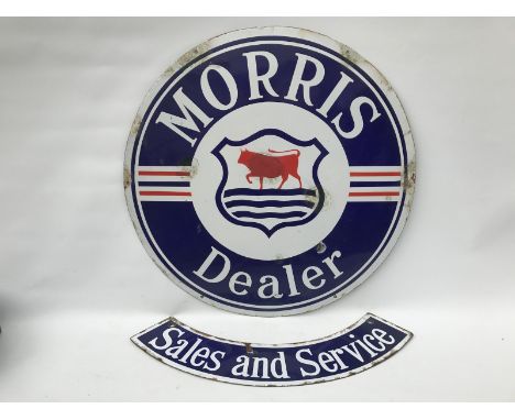 A Morris Dealer circular enamel sign with central bull motif, with 'Sales and Service' double sided enamel sign hanging attac