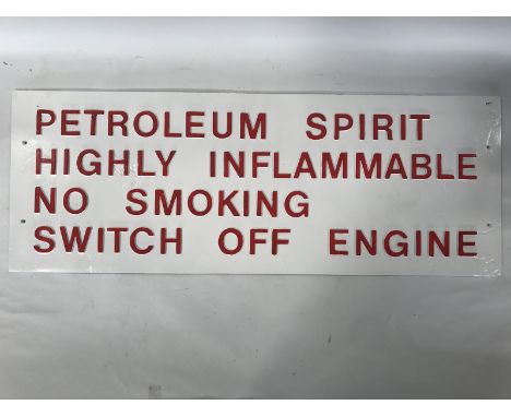 A rectangular cast aluminium garage forecourt sign - Petroleum Spirit Highly Inflammable Switch Off Engine, 37 1/2 x 14".