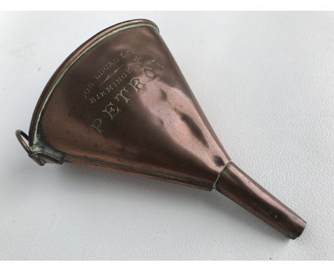 A Joseph Lucas Limited oval copper funnel of small size marked 'Petrol'. 