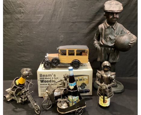 A novelty plaster model of a young football fan in a flat cap; a Beam's Woody 1929 Model A Ford vintage motor car Station wag