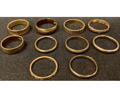 A 9ct gold wedding band, size R; nine other 9ct gold wedding bands, 23.5g (10) 