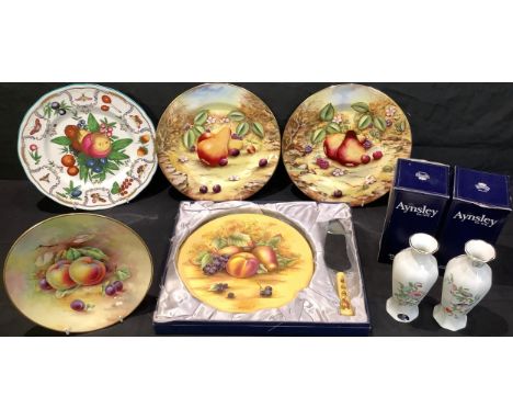 A pair of Spode cabinet plates by Ken Yates, printed and painted with ripe fruit, signed, 27cm diameter; a Minton cabinet pla