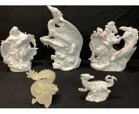 A ceramic model of George and the Dragon, 34cm; another dragon model glazed in white, 40cm; other dragon models (5) 