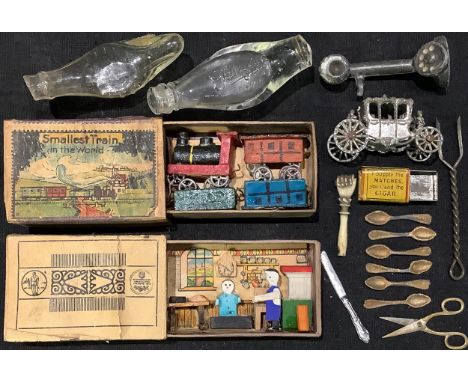 Boxes and Objects - The Smallest Train in the World, contained in a matchbox; other miniatures including a kitchen interior i