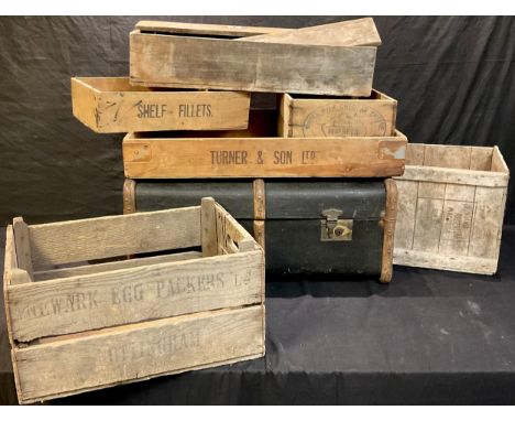 A vintage wooden bound travel trunk; assorted wooden crates (7) 