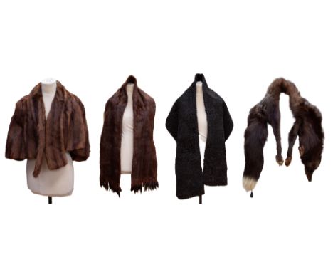 A red tinged shaded musquash fur cape, this fully lined item has longer pellets at the front which are longer than the rest o