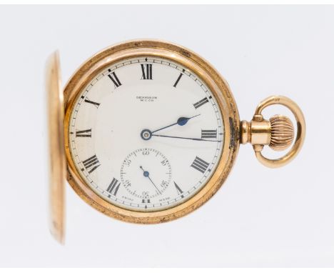 An early 20th century plated metal open faced Dennison pocket watch, comprising a white enamel dial with Roman numerals, subs