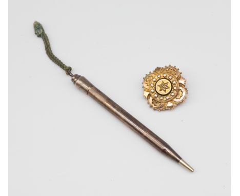 A Victorian pearl set mourning brooch with gold front metal reverse, pin and later roller clasp, width approx 28mm, total gro