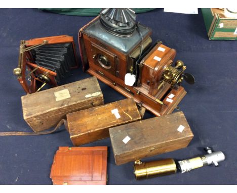 Argher and Sons of Liverpool, late 19th Century mahogany magic lantern with slides and accessories and a late 19th Century pa