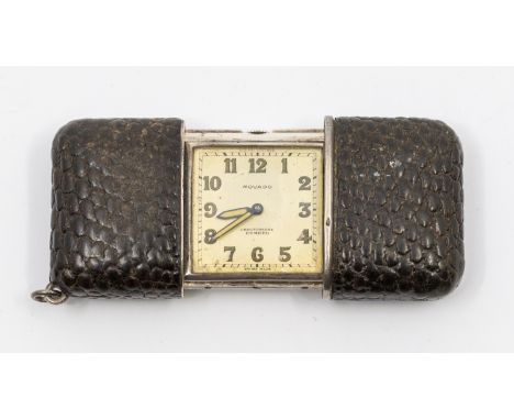 An Art Deco Movado silver cand leather cased Chronometre Ermeto purse travel watch, comprising a silver square dial with Arab