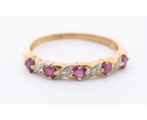 A ruby and diamond 9ct gold half eternity ring, claw set round mixed cut rubies with diamond accents, size S, total gross wei