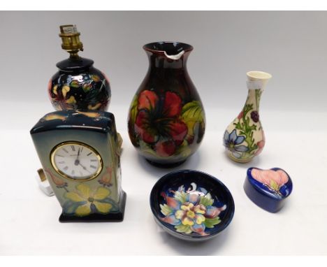 A small collection of Moorcroft Popttery to include ,A late 1960's flambe Hibiscus vase, an Oberon pattern lamp base, a Hyper