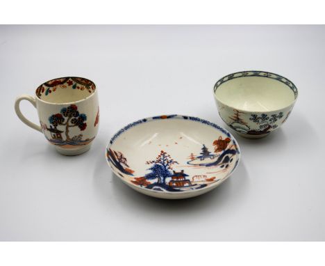                                                                                     A Lowestoft tea bowl, a Lowestoft saucer 