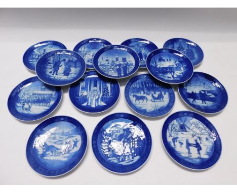 A collection of fourteen Royal Copenhagen Christmas plates with certificates.(14)