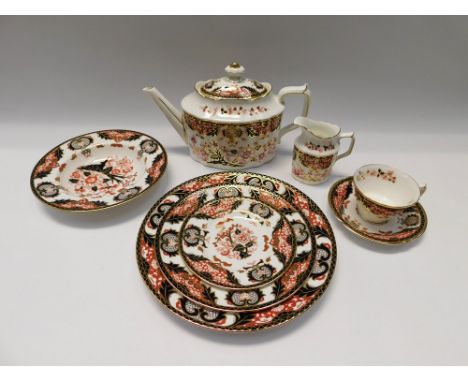 Royal Crown Derby:  A Japan pattern part dinner service to include:  6 x soup bowls; 6 x small plates; 1 x tea pot; 1 x milk 