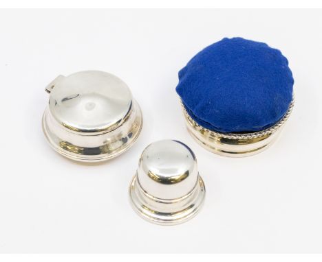 A 20th century sterling silver circular footed ring box, hinged domed cover and fabric interior, by Birks, approx. 4cm high, 
