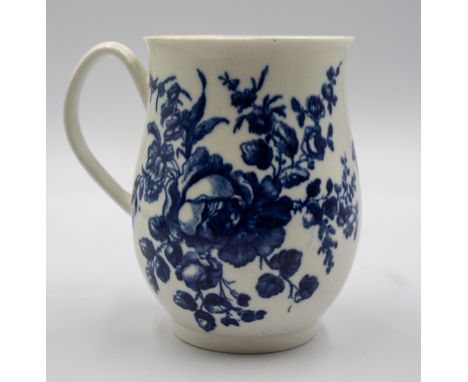 A Worcester porcelain mug with flowers and GrapesCirca 1770Height 12cm Hair Line crack restored, no other damage or restorati