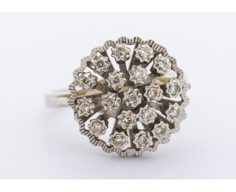 A diamond and 18ct white gold cluster ring, circular design set with small diamonds, diameter approx 15mm, size O, total gros