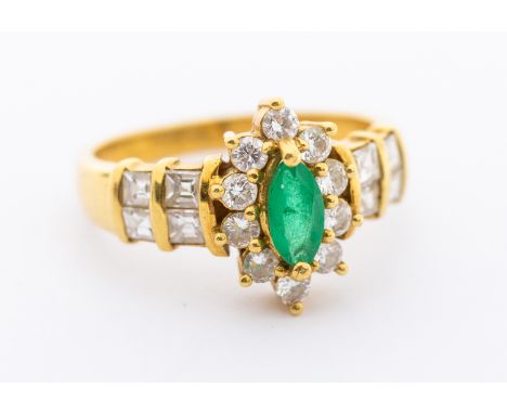 An emerald and diamond 18ct gold oval cluster ring, comprising a caw set marquise cut emerald approx 6 x 4mm, within a surrou