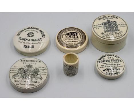 A small collection of black and white printed Prattware pot lids; and small jar Burgess's Anchovy Paste, with base, Woods Are