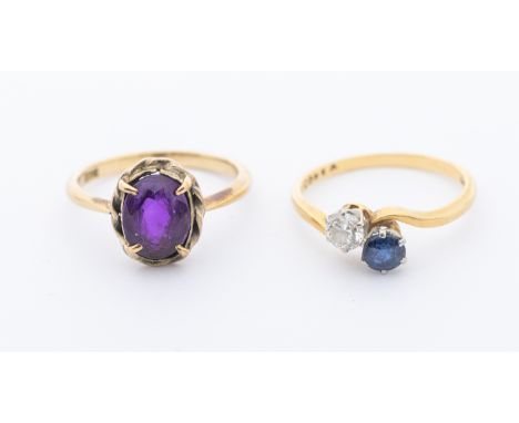 A sapphire doublet and diamond set 18ct gold toi et moi ring, set with a round mixed cut sapphire and round brilliant cut dia