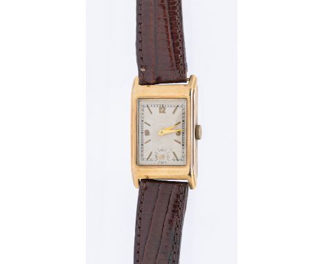 A gentleman's 9ct gold vintage wristwatch, comprising a rectangular silvered dial with applied gilt quarter Arabic numbers an