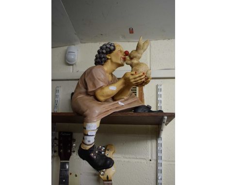 POTTERY MODEL OF A CLOWN