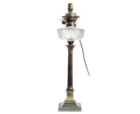 A silver plated Corinthian column table lamp, with a cut glass reservoir, the base marked 'HE & Co.Ltd' for Hawksworth & Eyre