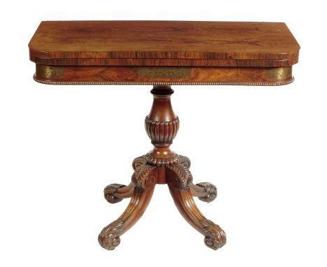 λ A Regency rosewood card table attributed to Gillows, the 'D' shaped swivel and fold-over top with a locking catch above a f