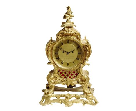 A Regency ormolu mantel clock in Louis XV style by James McCabe, the eight day fusee movement striking on a bell, the backpla