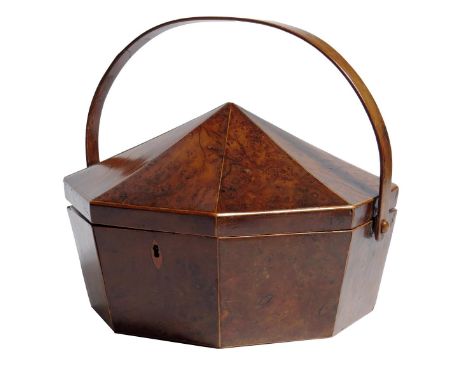 A Regency burr yew octagonal needlework box, with boxwood stringing the hinged tent-top with a swing handle and with a vacant