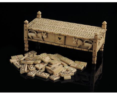 An early 19th century Napoleonic Prisoner of War carved bone games box, with part polychrome decoration, with a pair of cribb