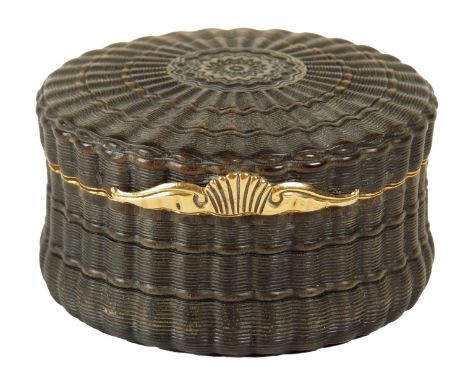λ A late 18th century French tortoiseshell snuff box, with engine turned decoration and gold mounts, with a shell thumbpiece,