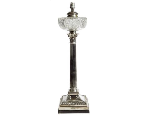 An Edwardian silver Corinthian column table lamp by Mappin & Webb, with a cut glass reservoir and a leaf wrapped base, hallma