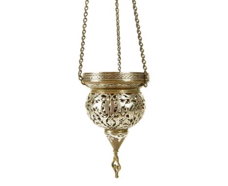 A 19th century Islamic Mamluk revival brass hanging mosque lamp, with copper and silver damascened decoration with pierced sc