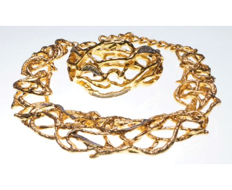 Elizabeth Taylor: 'Treasure Vines' necklace, ear clip and bangle suite, circa 1994
Designed for Avon, of abstract open work d