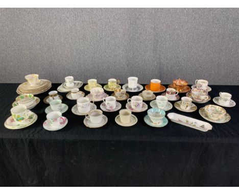 An extensive collection of 19th century and later porcelain items, mostly coffee and tea cups and saucers. Dia.22cm.(largest)