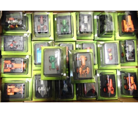 TWENTY-ONE 1/43 SCALE HACHETE DIECAST MODEL TRACTORS  each mint or near mint and in original bubble packaging. 