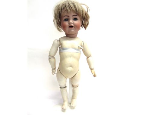 A SIMON &amp; HALBIG FOR KAMMER &amp; REINHARDT BISQUE SOCKET HEAD DOLL  with a cropped and partially sun-bleached brown wig,