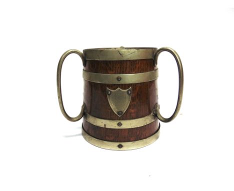 A SOMERSET LIGHT INFANTRY (2ND VOLUNTEER BATTALION) DRILL CHALLENGE THREE-HANDLED CIDER CUP  oak with nickel bands and handle