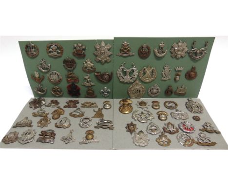 ASSORTED CAP BADGES RELATING TO REGIMENTS MOBILIZED IN 1939  comprising those for the Lancashire Fusiliers, King's Own Scotti