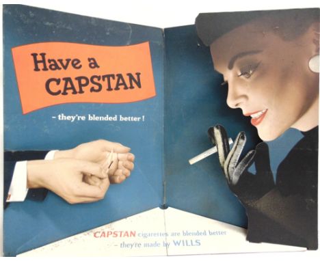 A WILLS'S CAPSTAN CIGARETTES PRINTED FOLDING THREE-DIMENSIONAL SHOWCARD  depicting a gentleman's hand lighting a lady's cigar